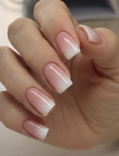 Soft pink to white ombre nails